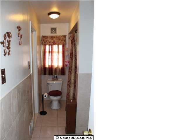 1137 Leonard Road Point Pleasant, NJ 08742 - Photo 8 of 25 a bathroom with a shower