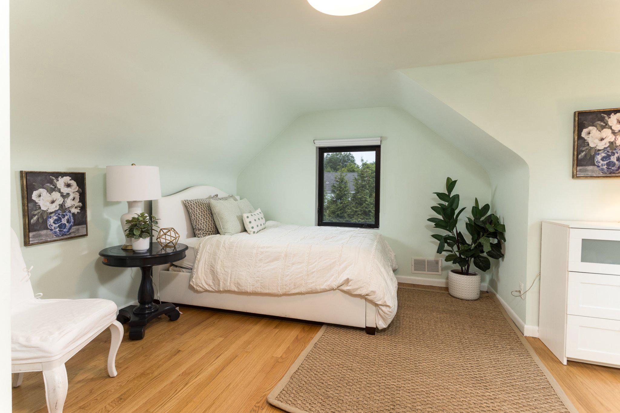 7006 Copeleigh Road Baltimore, MD 21212 - Photo 27 of 43 a bedroom with a bed and a table