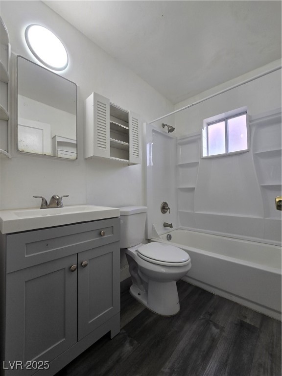 432 North 15th Street, Unit B Las Vegas, NV 89101 - Photo 8 of 9 Full bathroom featuring vanity, shower / washtub combination, and dark wood-style floors