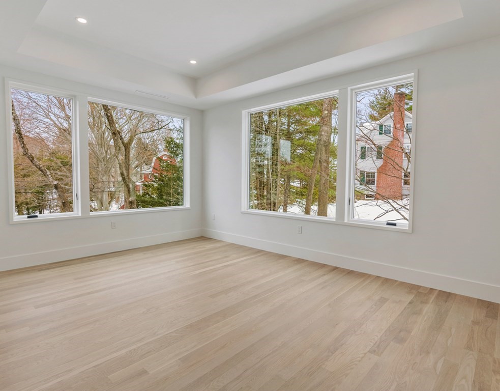 28 Eliot Road Lexington, MA 02421 - Photo 18 of 23 a view of an empty room with a window