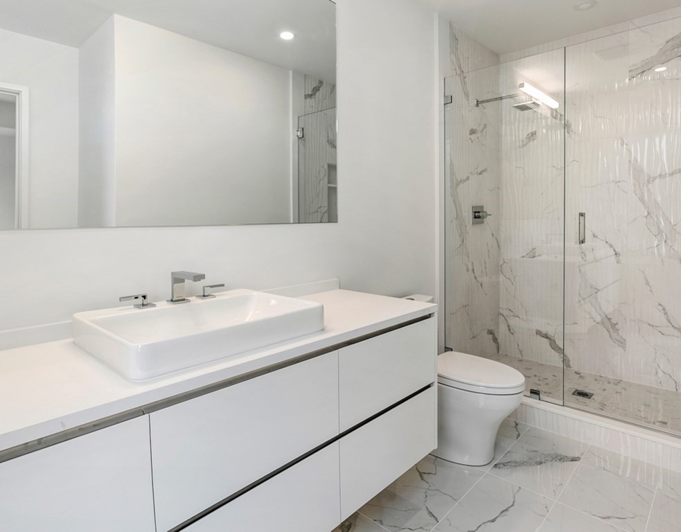 28 Eliot Road Lexington, MA 02421 - Photo 19 of 23 a bathroom with a sink toilet and shower