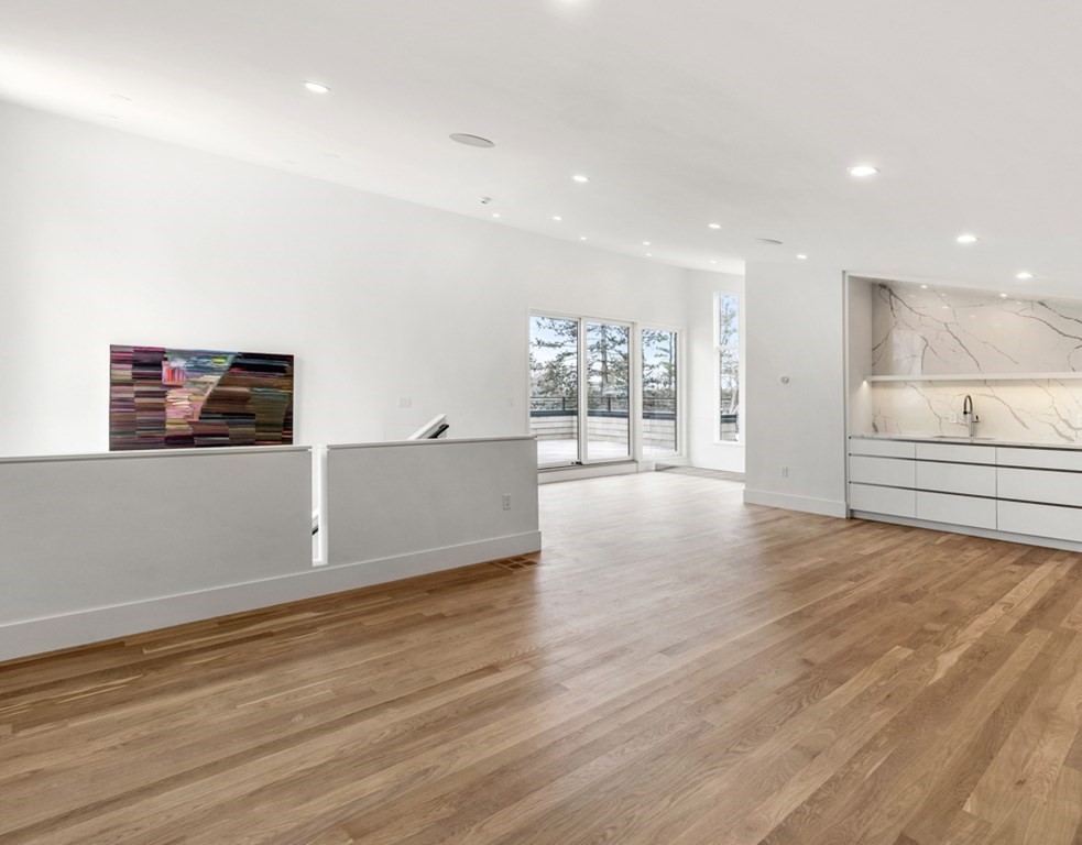 28 Eliot Road Lexington, MA 02421 - Photo 21 of 23 a view of a livingroom with wooden floor