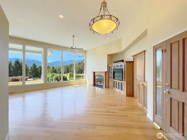 a view of livingroom with furniture wooden floor and window