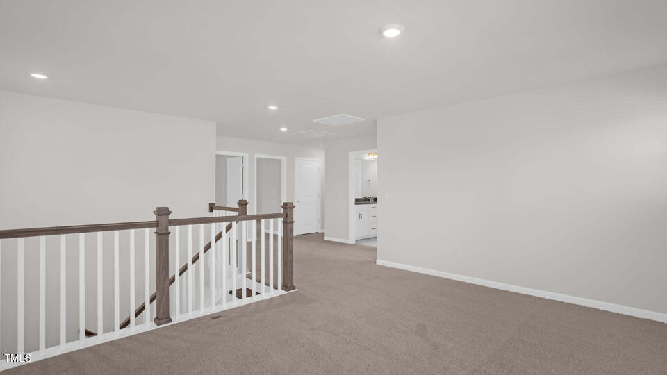 176 Red Jasper Way Clayton, NC 27520 - Photo 14 of 35 a view of hallway with livingroom