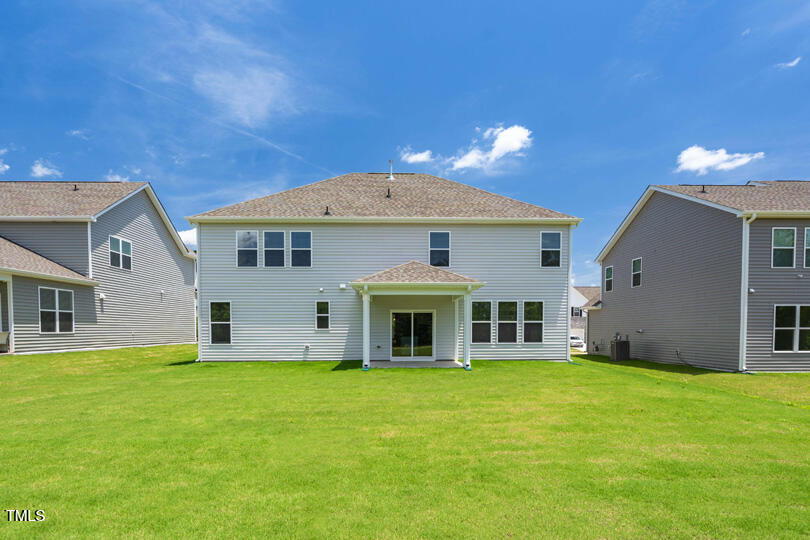 176 Red Jasper Way Clayton, NC 27520 - Photo 30 of 35 a front view of a house with a yard