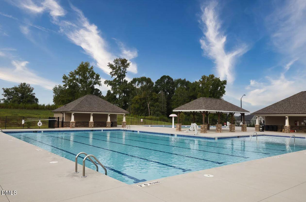 176 Red Jasper Way Clayton, NC 27520 - Photo 32 of 35 a view of a house with yard and sitting area