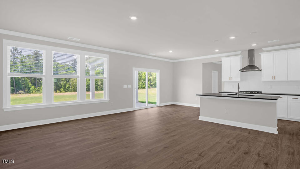 176 Red Jasper Way Clayton, NC 27520 - Photo 6 of 35 a view of kitchen with wooden floor and electronic appliances