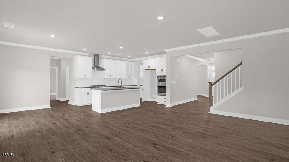 176 Red Jasper Way Clayton, NC 27520 - Photo 7 of 35 a view of kitchen with wooden floor
