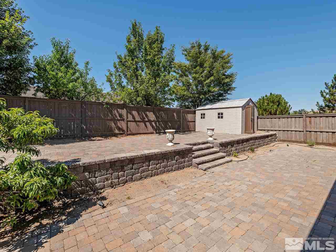 404 Sysonby Court Reno, NV 89521 - Photo 19 of 25 a view of a backyard