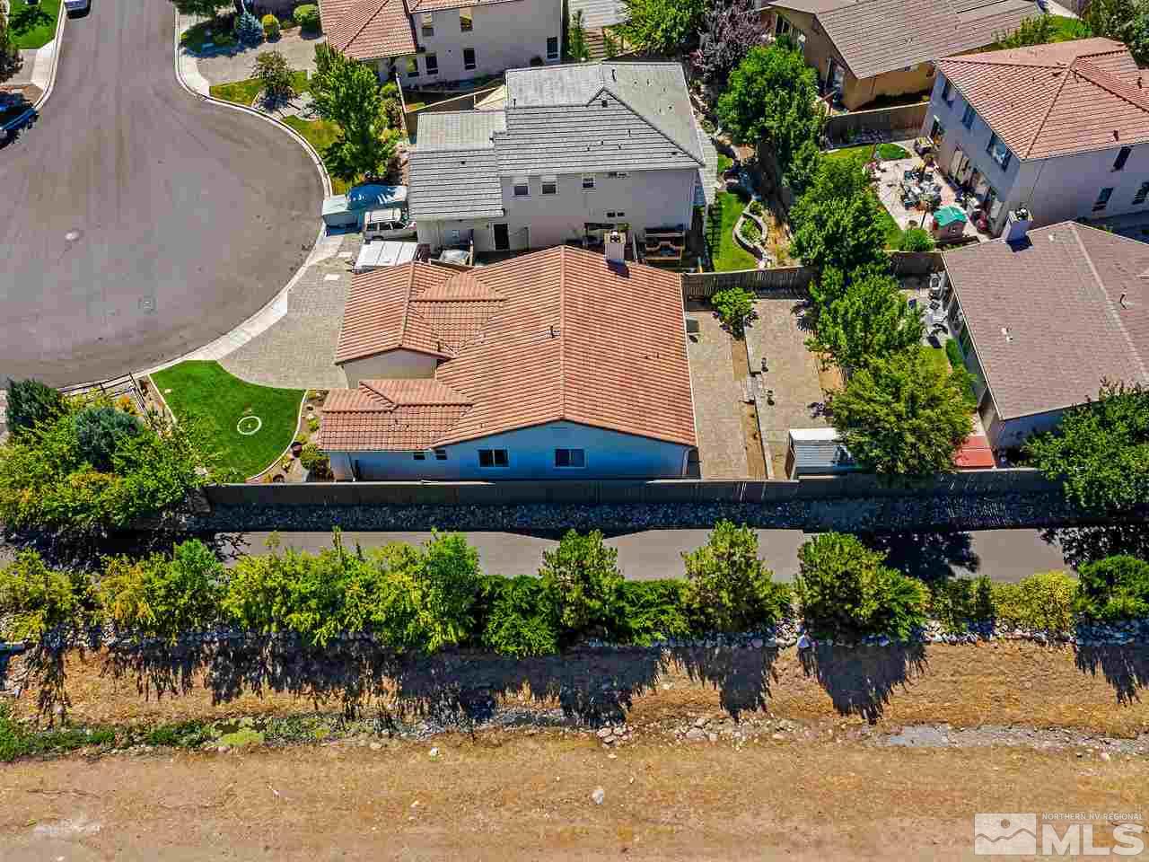 404 Sysonby Court Reno, NV 89521 - Photo 22 of 25 an aerial view of a house with garden space and street view