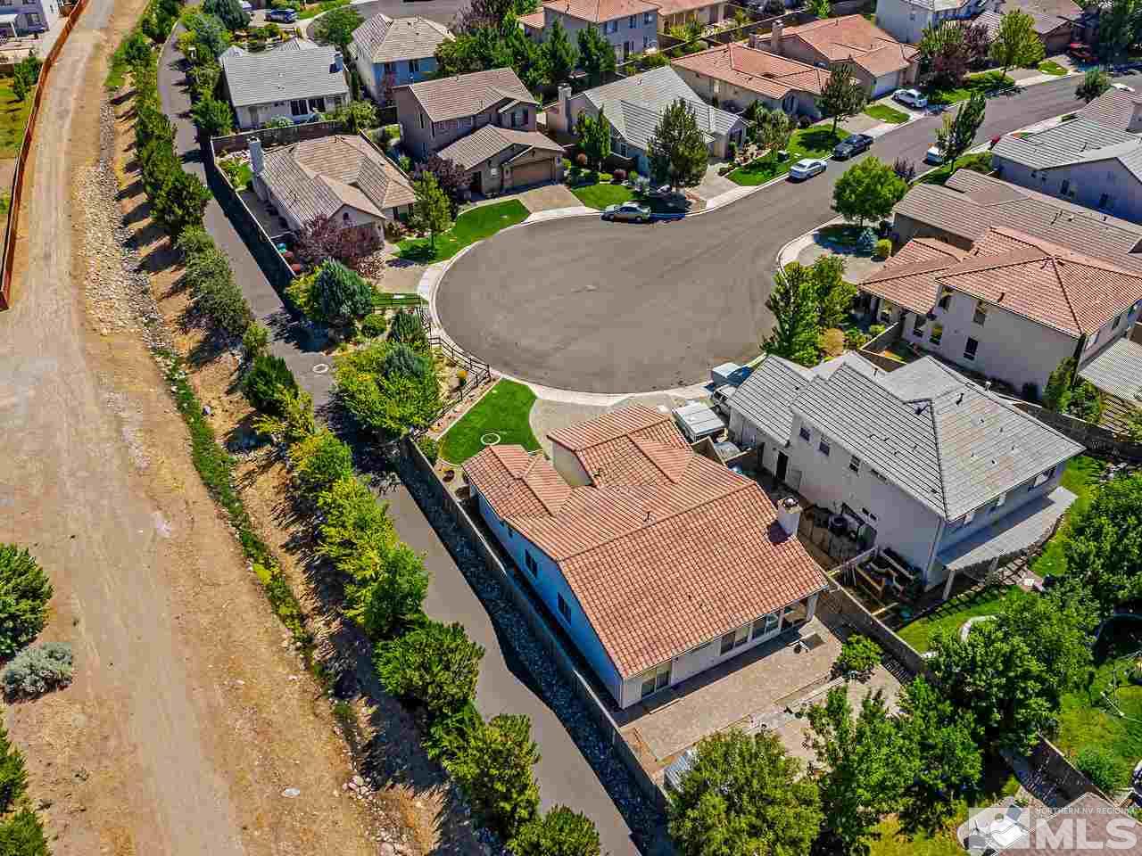 404 Sysonby Court Reno, NV 89521 - Photo 23 of 25 an aerial view of a house with outdoor space