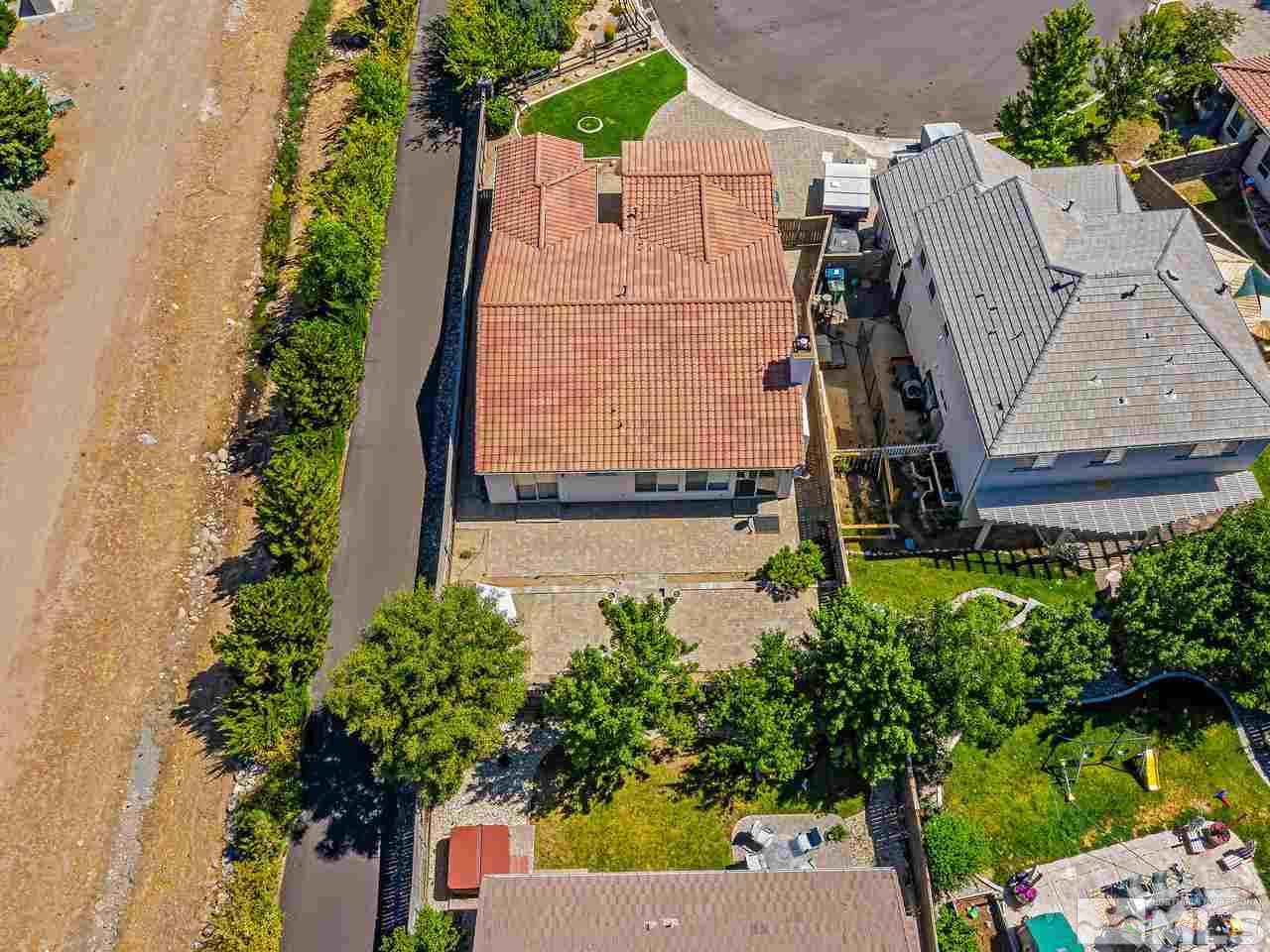 404 Sysonby Court Reno, NV 89521 - Photo 24 of 25 an aerial view of a house with a garden