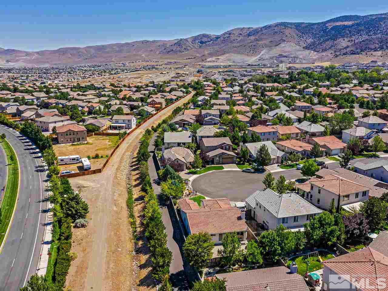 404 Sysonby Court Reno, NV 89521 - Photo 25 of 25 an aerial view of a city with lots of residential buildings