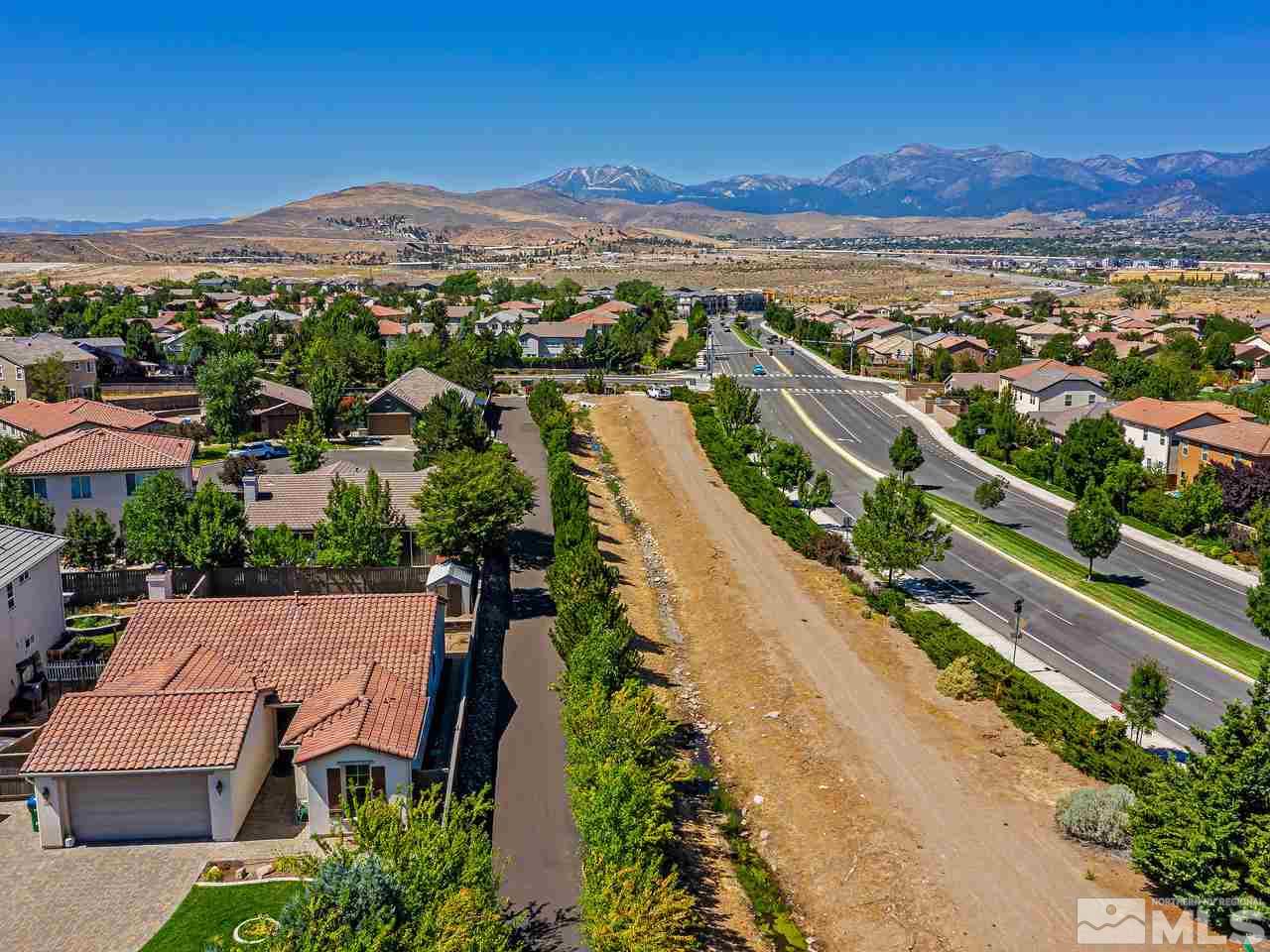 404 Sysonby Court Reno, NV 89521 - Photo 4 of 25 an aerial view of residential houses with outdoor space and river
