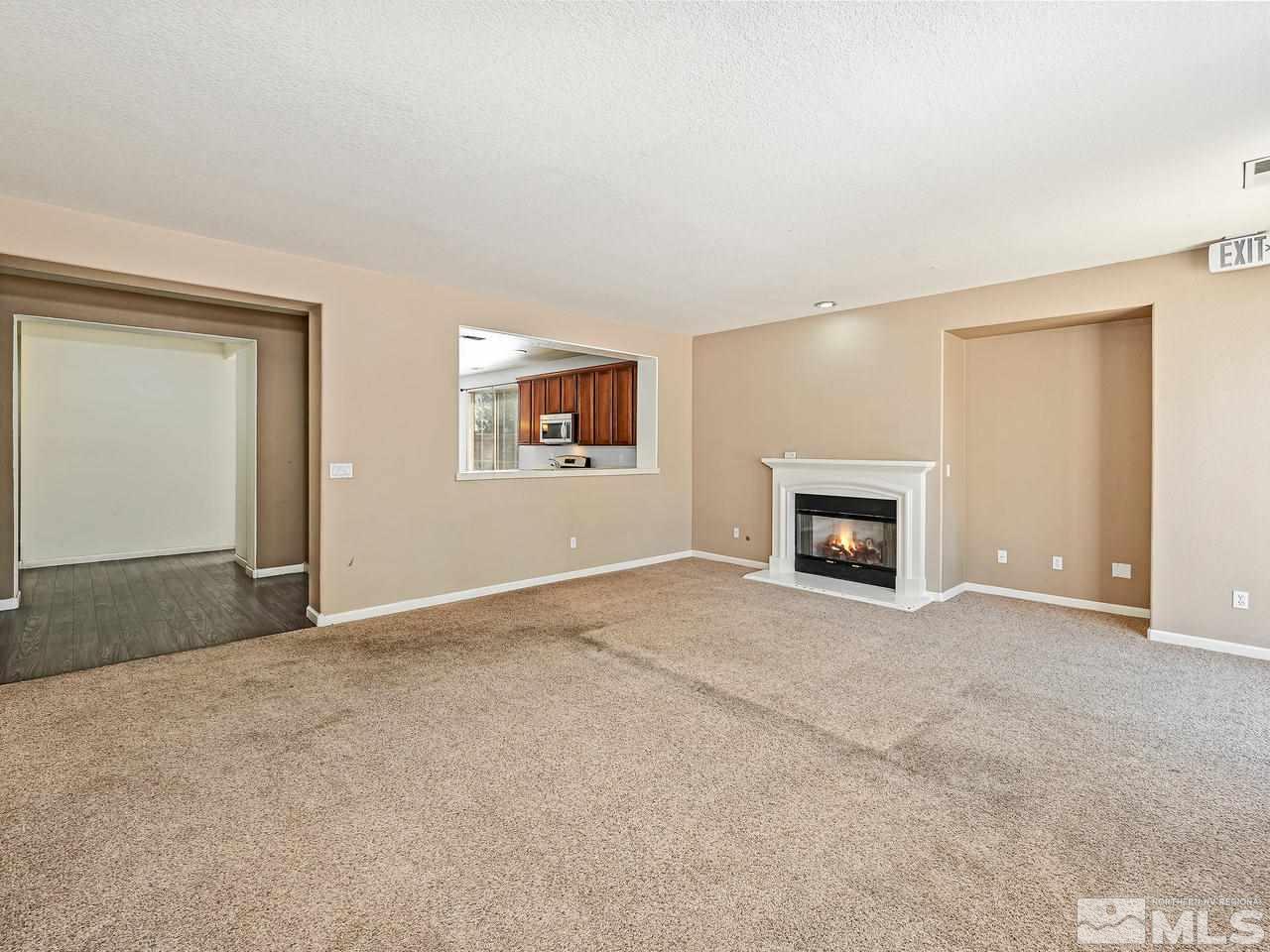 404 Sysonby Court Reno, NV 89521 - Photo 8 of 25 an empty room with windows