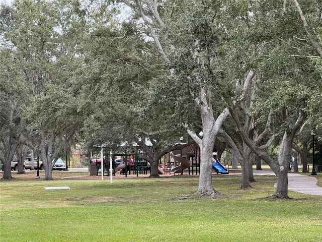 a building with trees in the background
