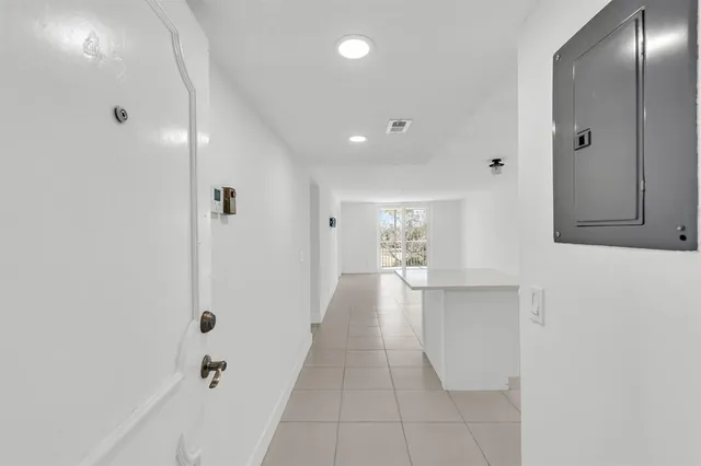a kitchen with a sink and a stove top oven