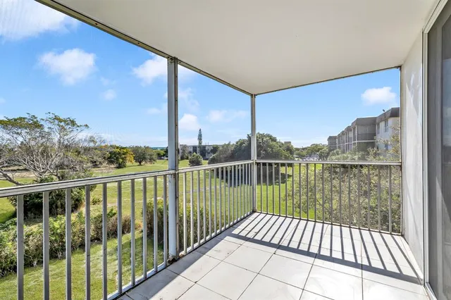 a view of a lake with a big yard