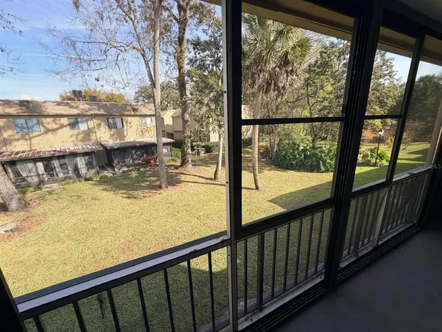 a view of swimming pool from a balcony