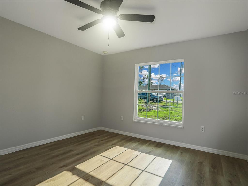 16619 Southwest 31st Circle Ocala, FL 34473 - Photo 18 of 26 an empty room with a empty space and a window