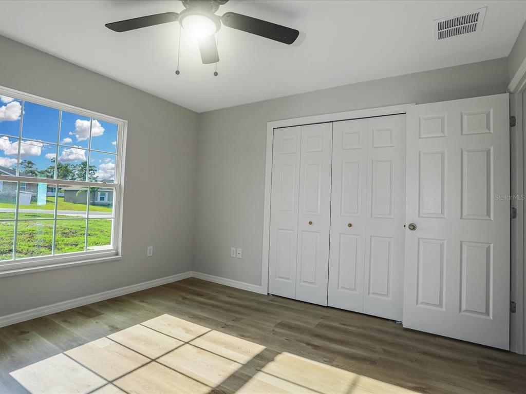 16619 Southwest 31st Circle Ocala, FL 34473 - Photo 19 of 26 a view of an empty room and window