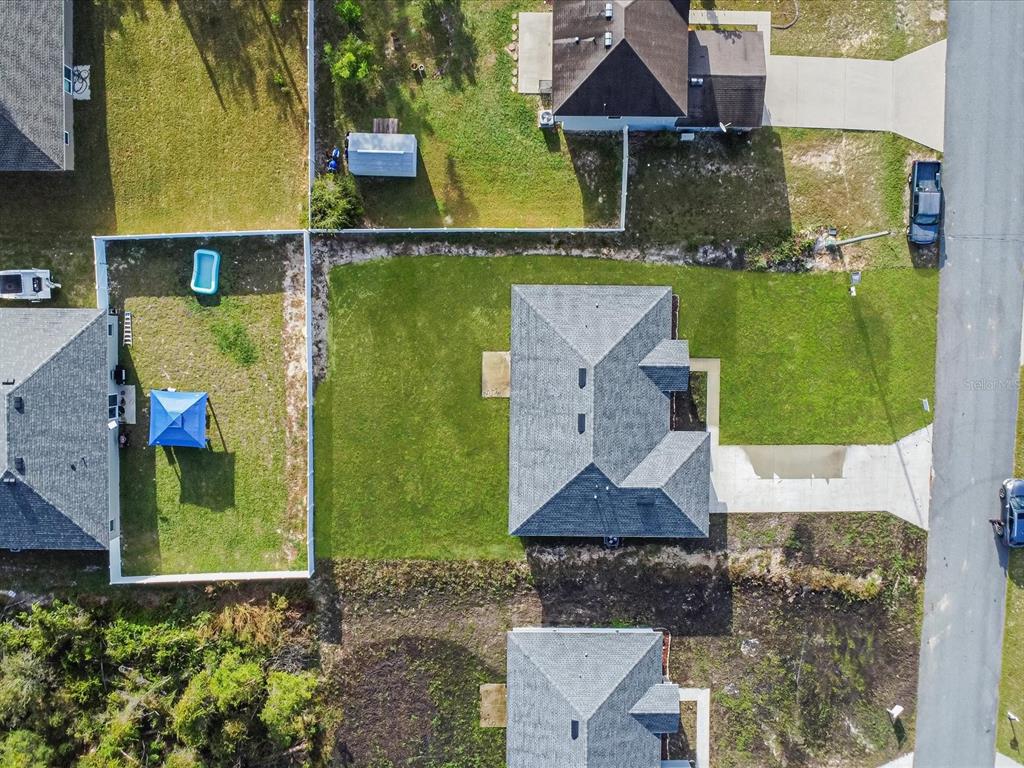 16619 Southwest 31st Circle Ocala, FL 34473 - Photo 20 of 26 a aerial view of a house with a garden