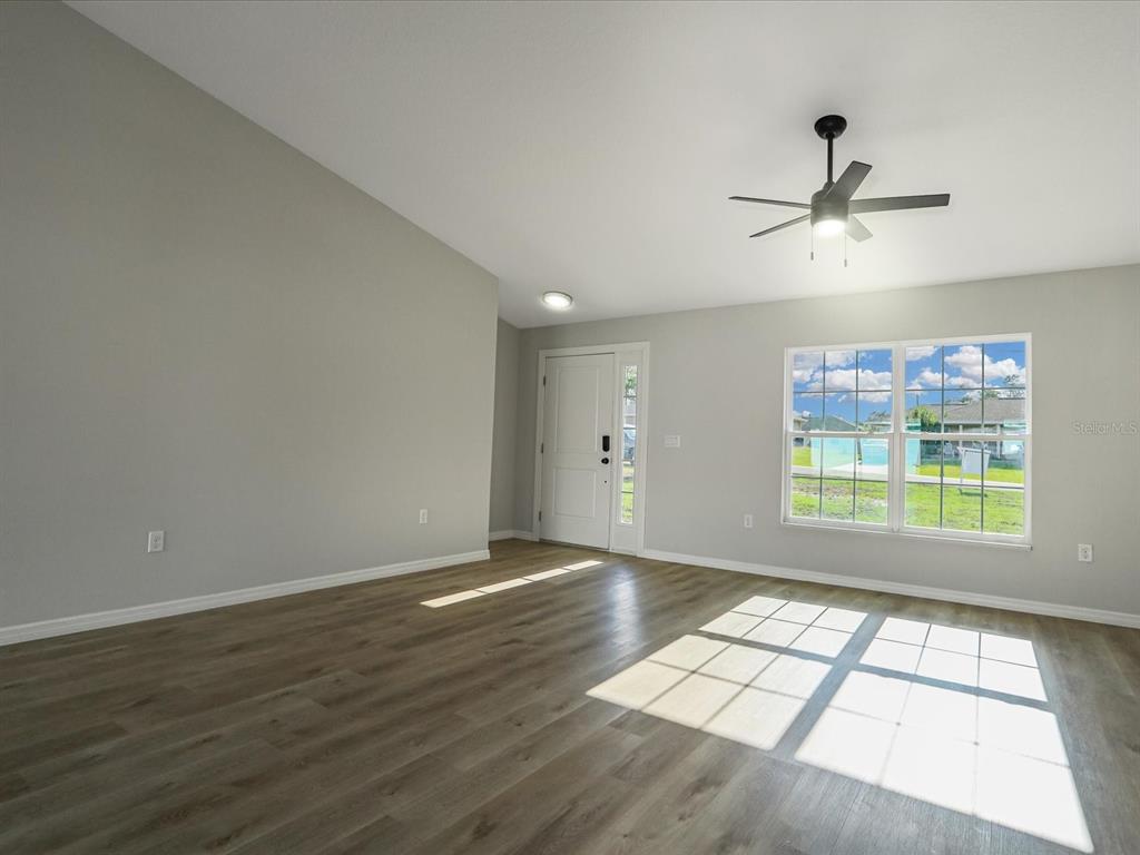 16619 Southwest 31st Circle Ocala, FL 34473 - Photo 10 of 26 a view of an empty room with a window