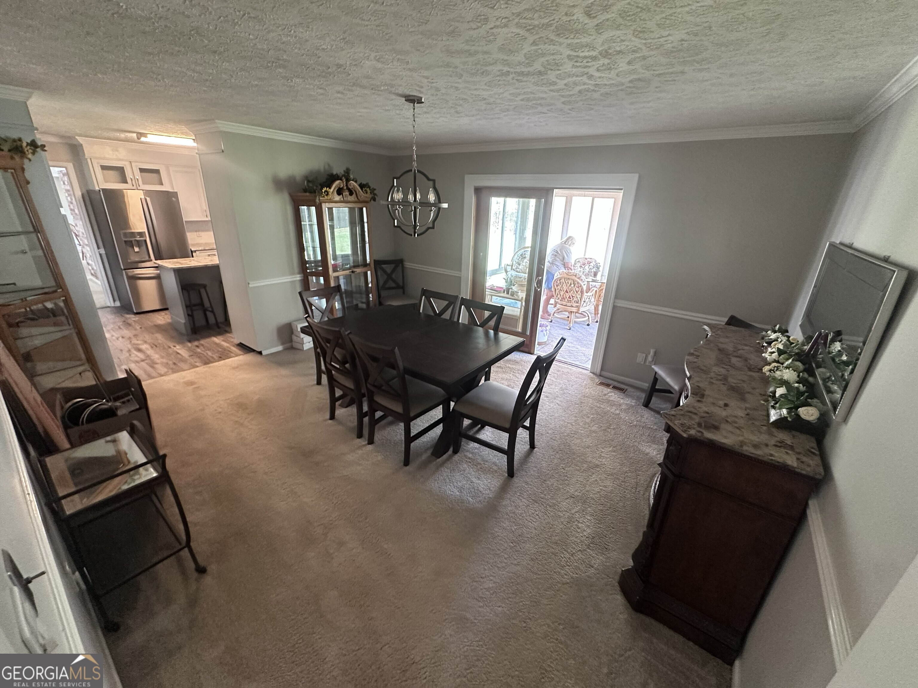 108 Sitton Avenue Gordon, GA 31031 - Photo 3 of 6 a view of a dining room with furniture and window