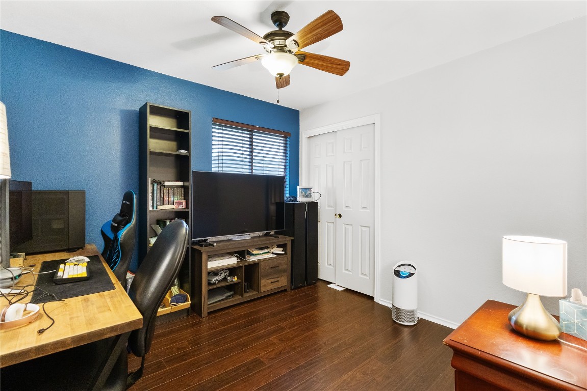 317 Strawn Kyle, TX 78640 - Photo 24 of 38 a workspace with furniture and wooden floor