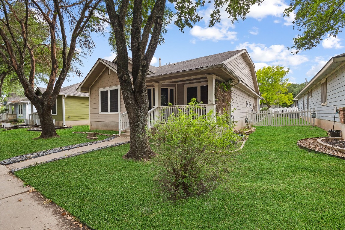 317 Strawn Kyle, TX 78640 - Photo 3 of 38 a front view of a house with garden