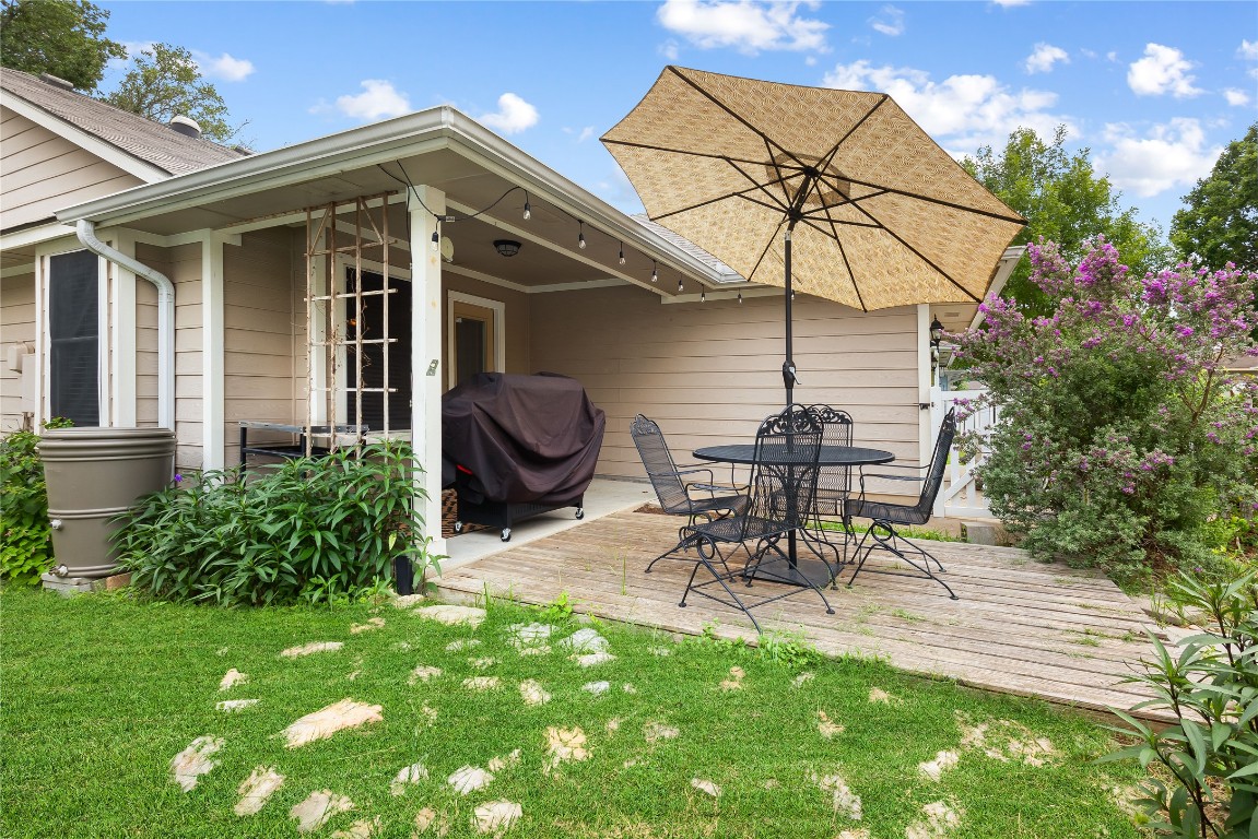 317 Strawn Kyle, TX 78640 - Photo 31 of 38 a view of a chair and table in backyard of the house