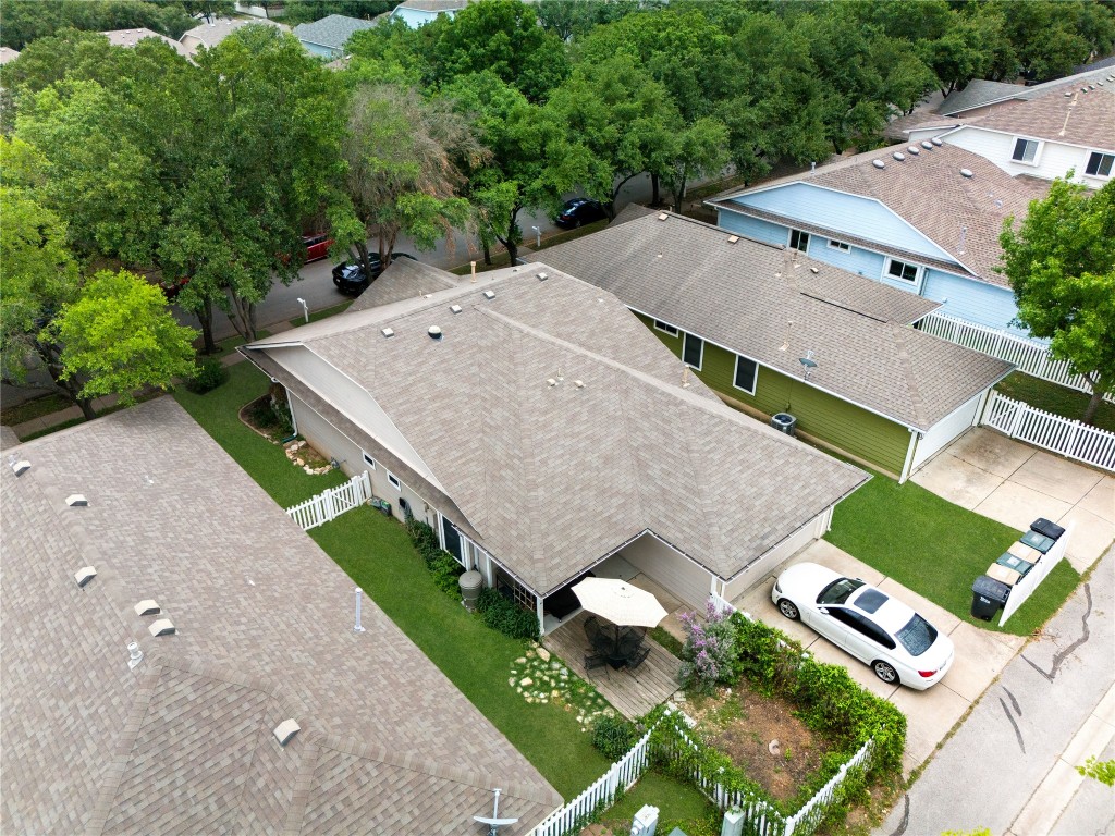 317 Strawn Kyle, TX 78640 - Photo 34 of 38 an aerial view of a house with a yard and trees