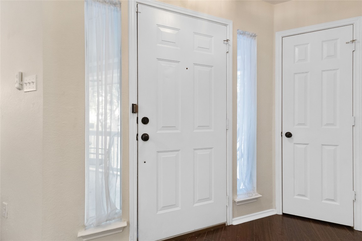 317 Strawn Kyle, TX 78640 - Photo 8 of 38 an empty room with wooden floor