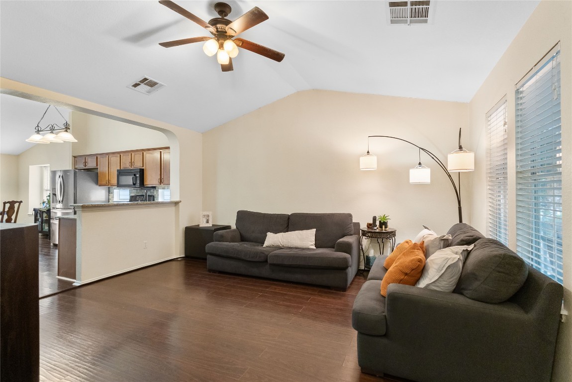 317 Strawn Kyle, TX 78640 - Photo 10 of 38 a living room with furniture and a wooden floor