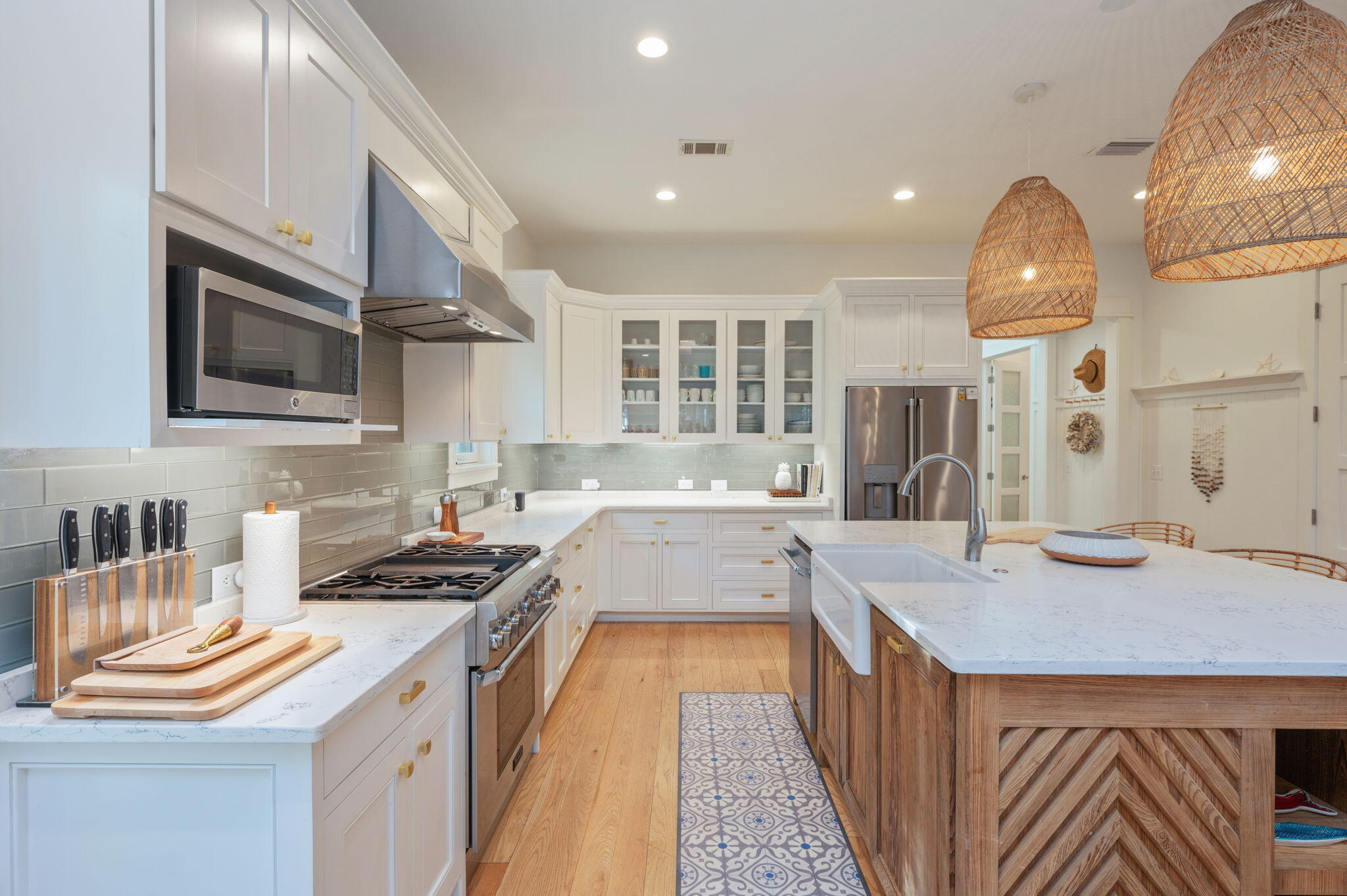 60 Red Cedar Way Santa Rosa Beach, FL 32459 - Photo 14 of 75 a kitchen with stainless steel appliances granite countertop a sink stove and cabinets