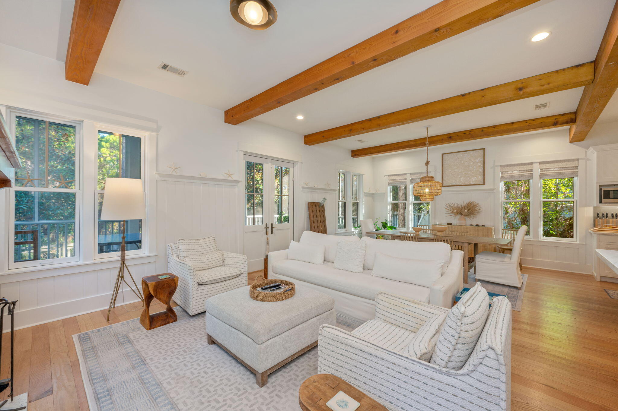 60 Red Cedar Way Santa Rosa Beach, FL 32459 - Photo 19 of 75 a living room with furniture and a large window