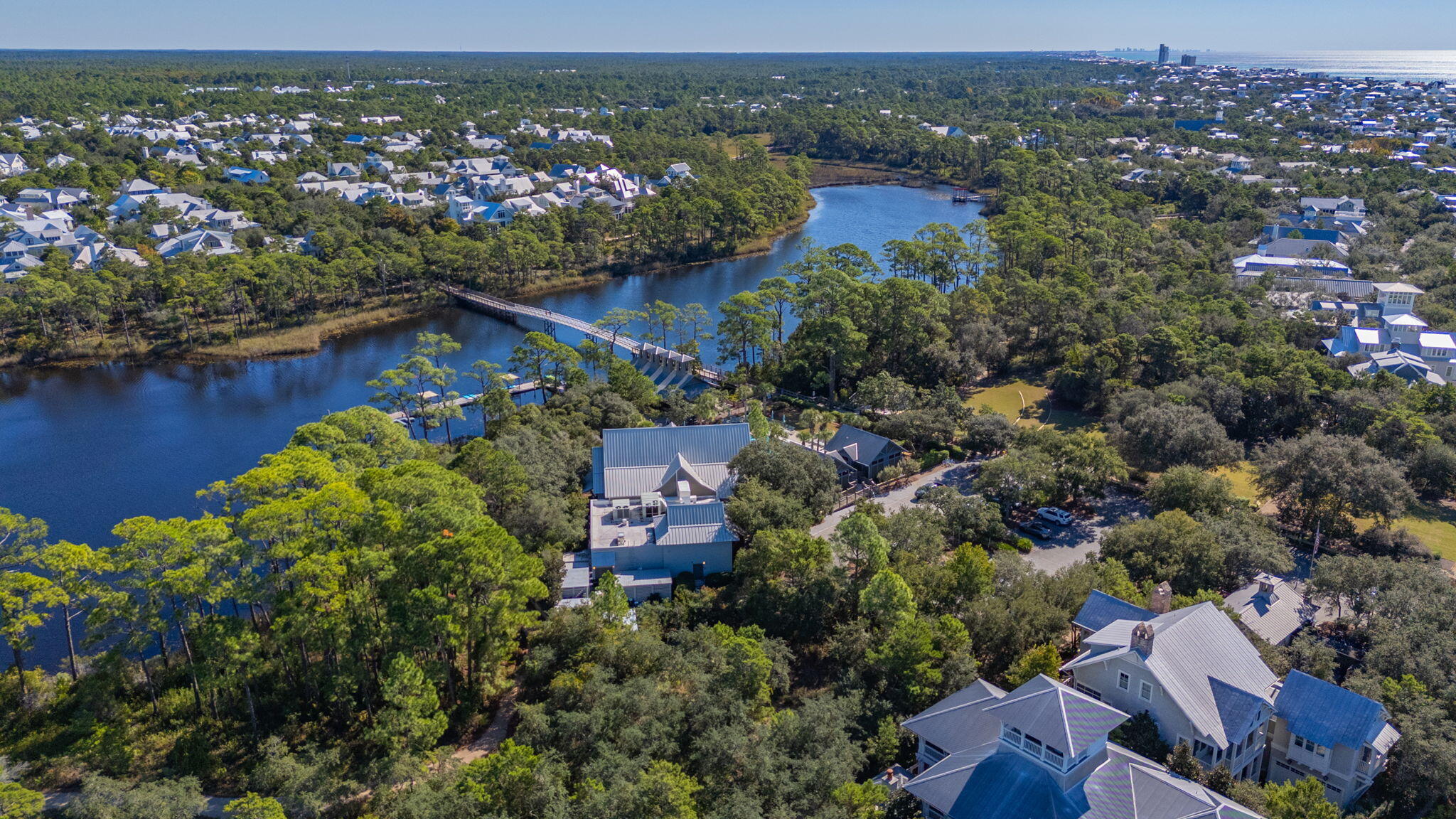 60 Red Cedar Way Santa Rosa Beach, FL 32459 - Photo 68 of 75 an aerial view of residential houses with outdoor space and lake view