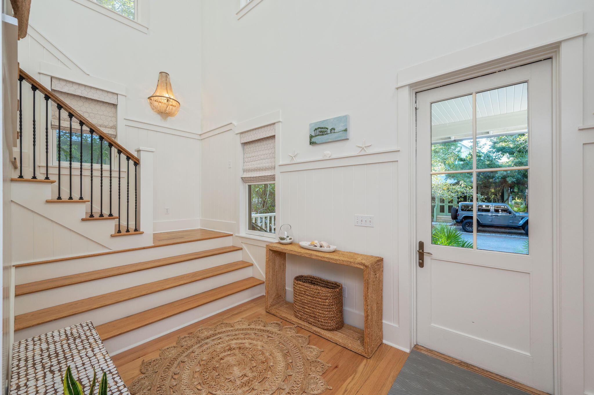 60 Red Cedar Way Santa Rosa Beach, FL 32459 - Photo 7 of 75 a view of a livingroom with wooden floor and a staircase
