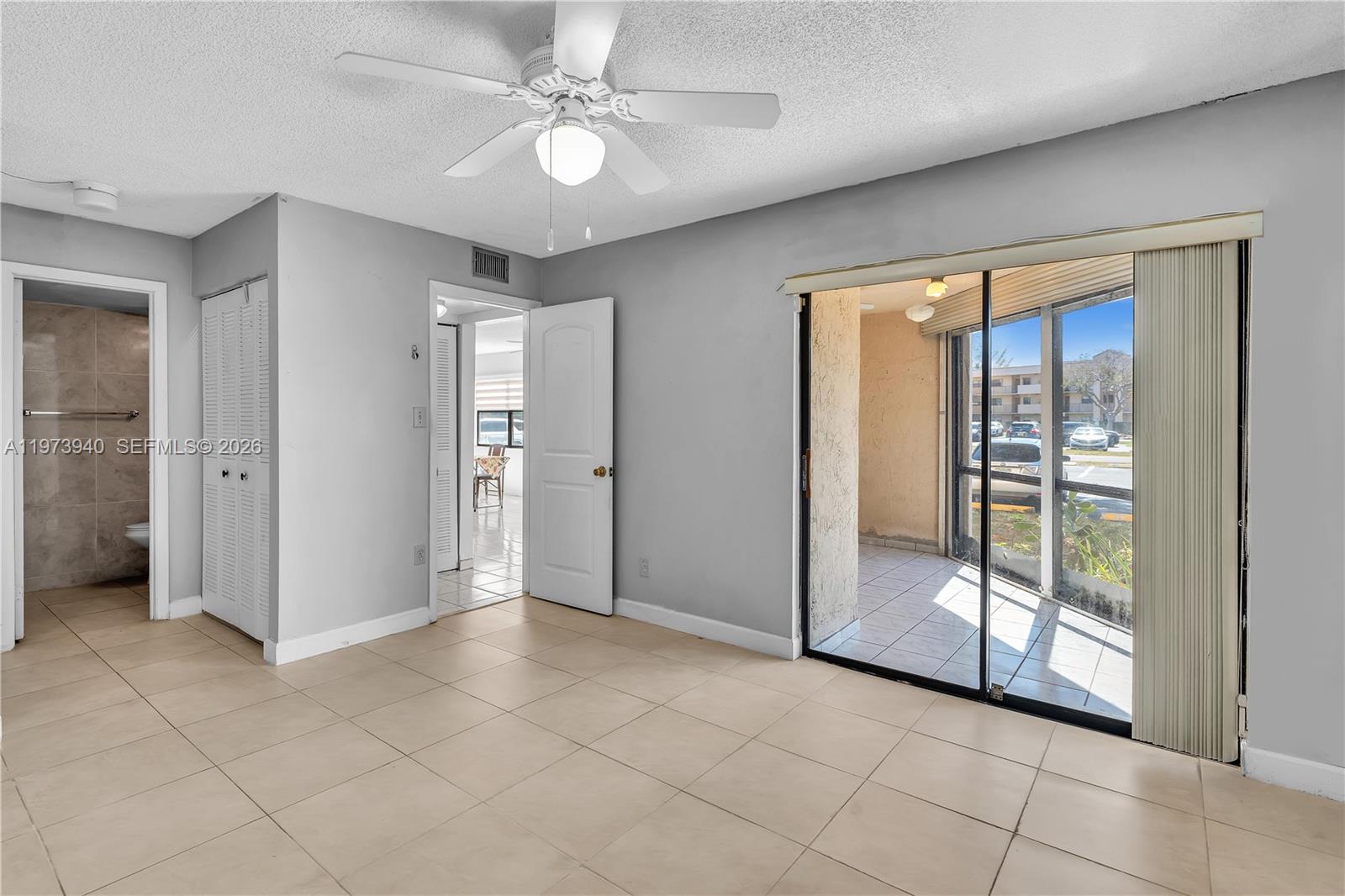 3252 Foxcroft Road, Unit 102 Miramar, FL 33025 - Photo 11 of 34 Master Bedroom