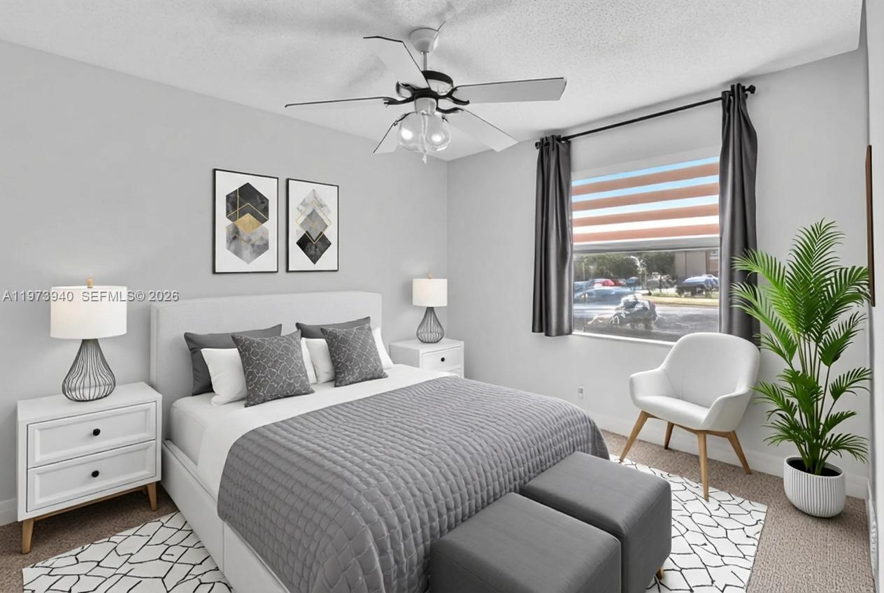 3252 Foxcroft Road, Unit 102 Miramar, FL 33025 - Photo 20 of 34 Staged Guest Bedroom 2