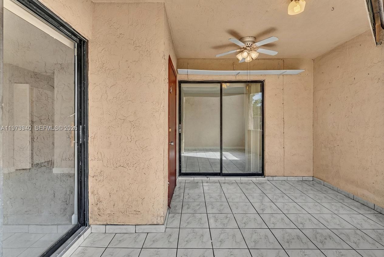 3252 Foxcroft Road, Unit 102 Miramar, FL 33025 - Photo 24 of 34 Screened Patio