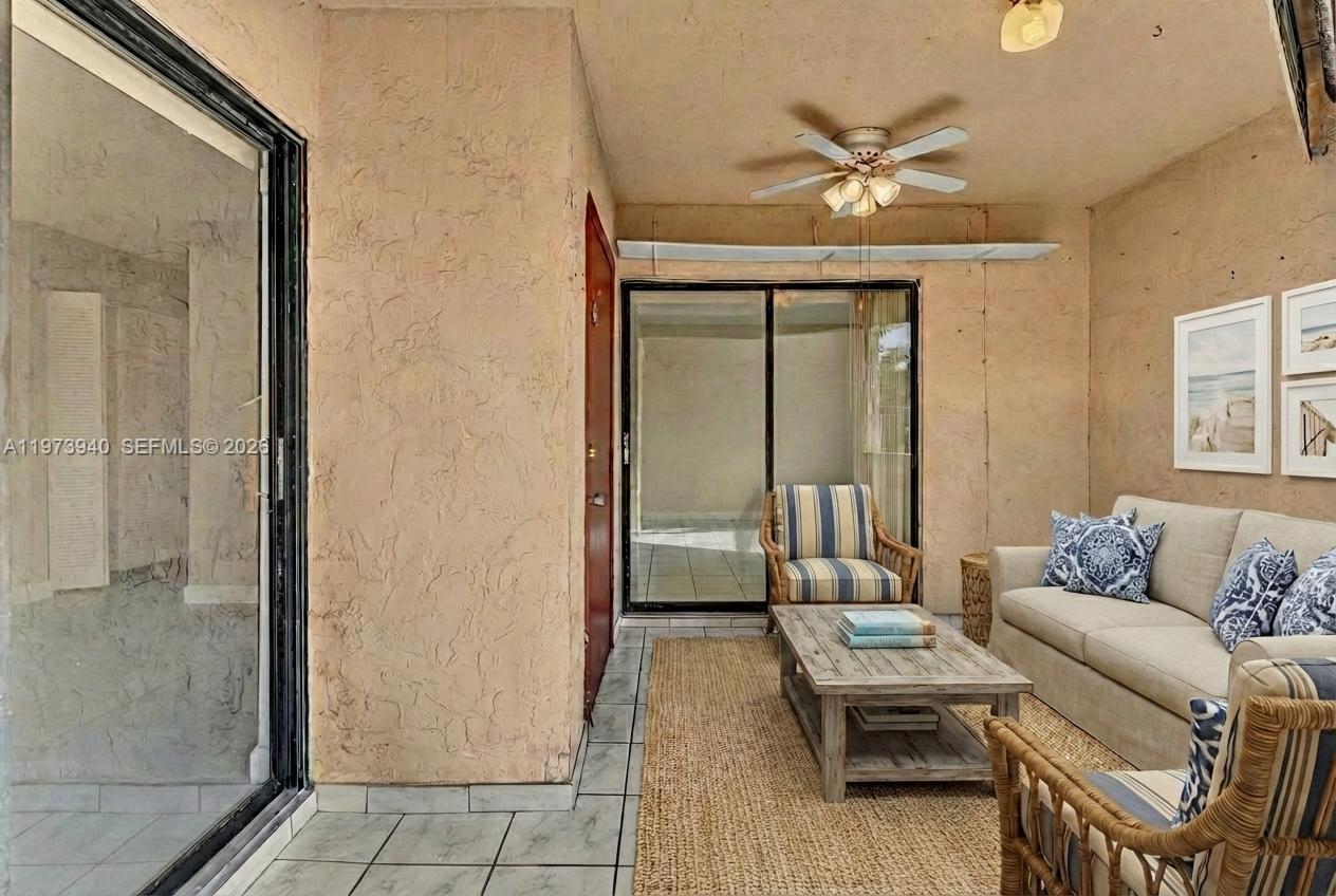 3252 Foxcroft Road, Unit 102 Miramar, FL 33025 - Photo 25 of 34 Staged Screened Patio Area