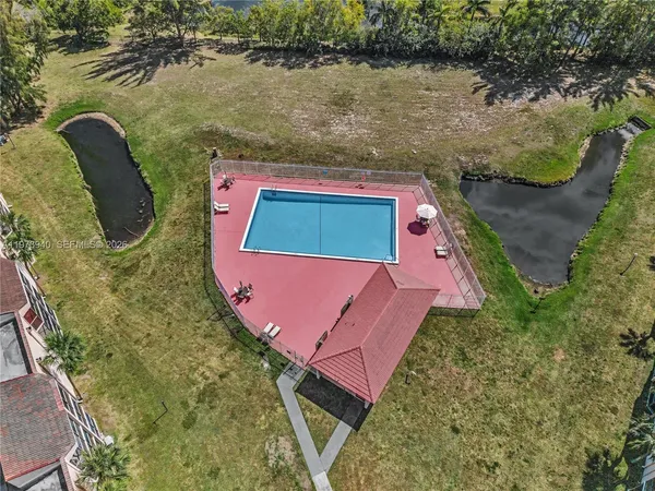 a view of a street with a building in the background