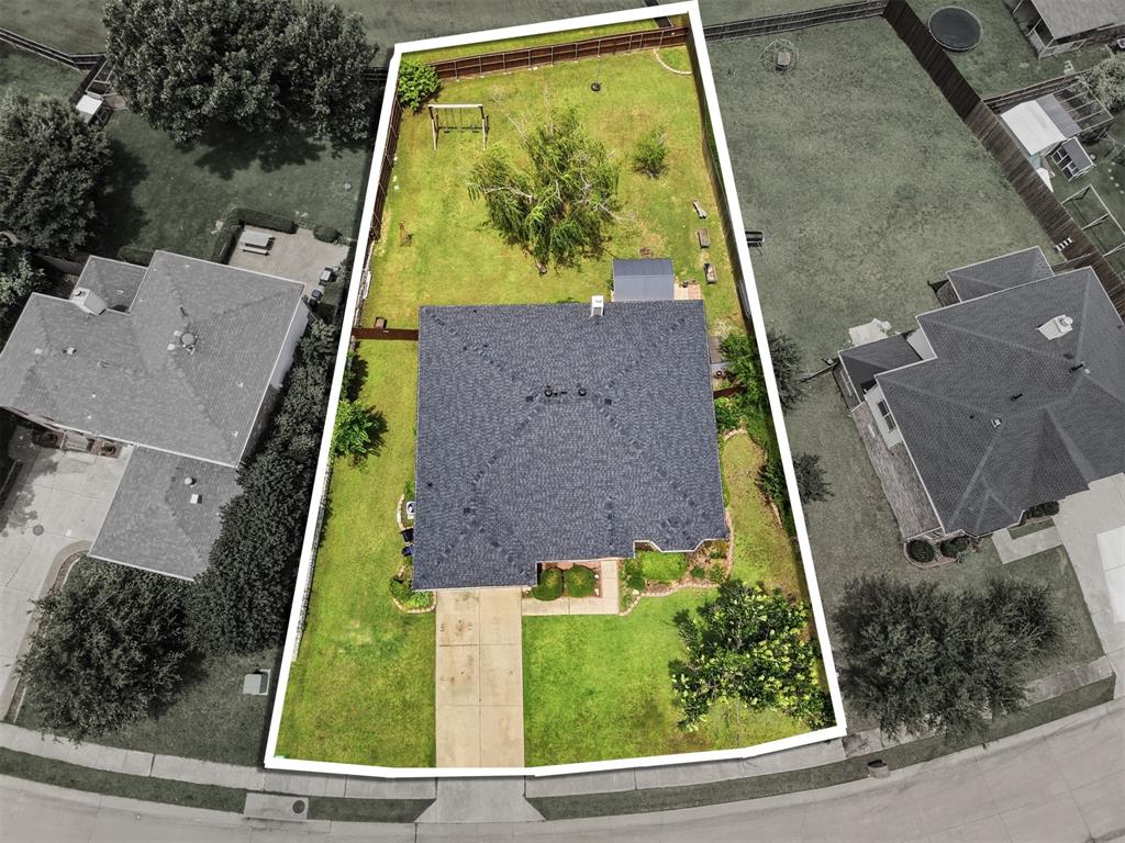 1213 Hampton Drive Forney, TX 75126 - Photo 25 of 27 an aerial view of a house with garden