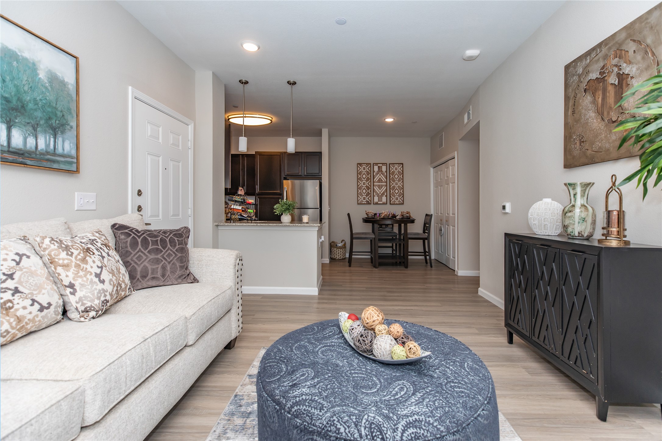 14809 Ralston Road, Unit A18302 Humble, TX 77396 - Photo 8 of 16 a living room with furniture and wooden floor