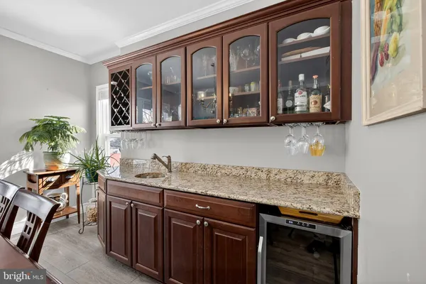 a kitchen with stainless steel appliances granite countertop a stove and a sink