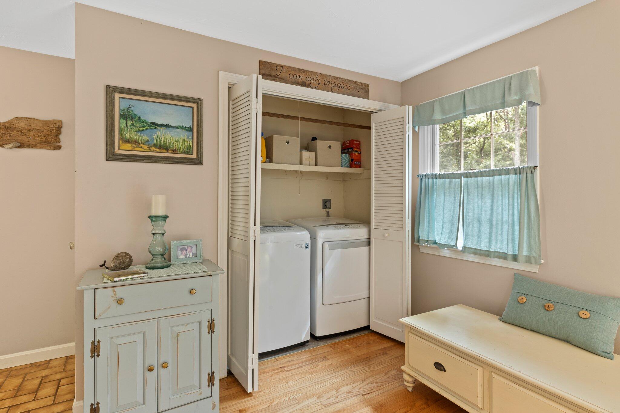 131 Clamshell Cove Road Cotuit, MA 02635 - Photo 21 of 67 a room with a bed and a window