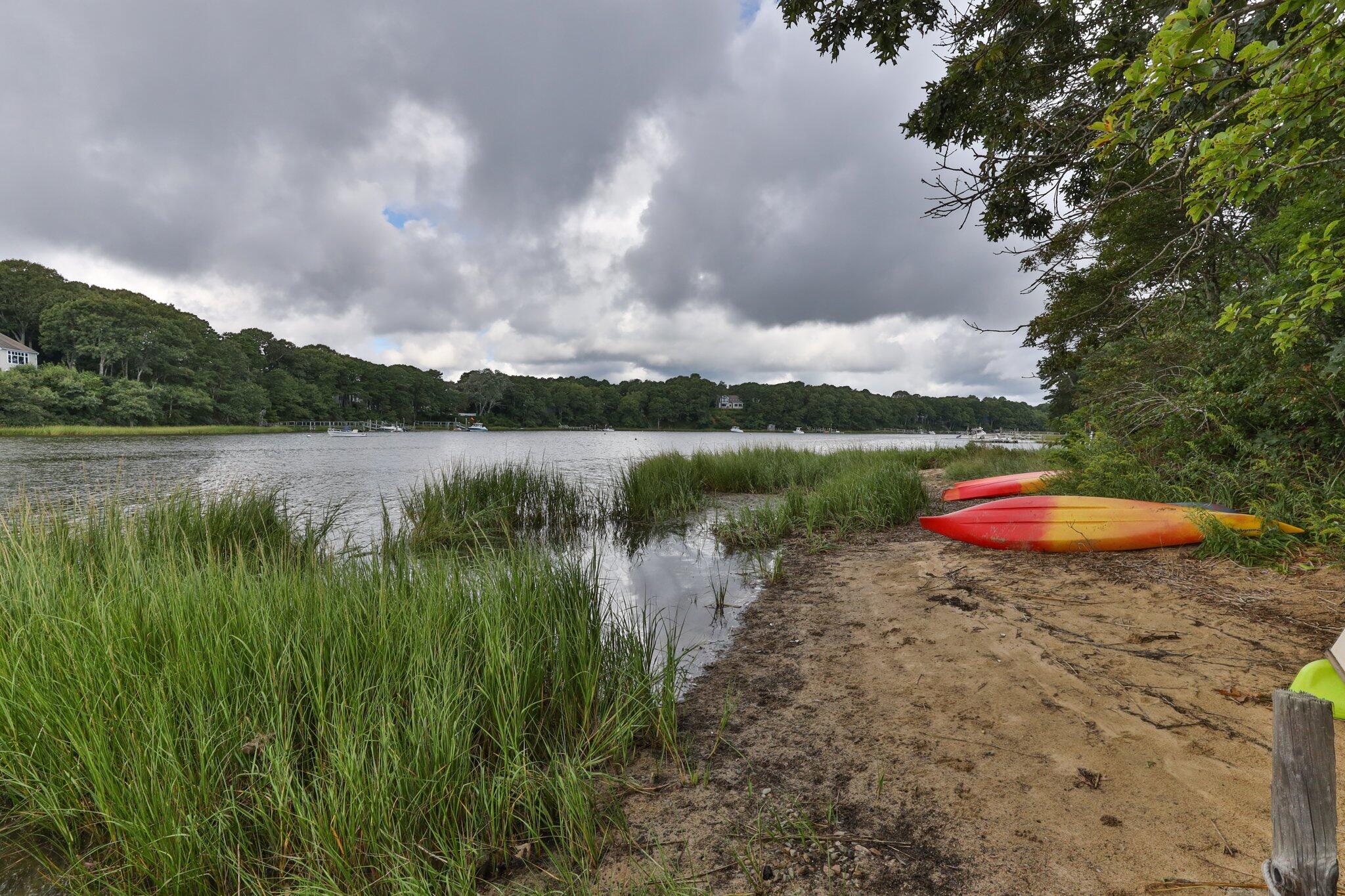 131 Clamshell Cove Road Cotuit, MA 02635 - Photo 62 of 67 a view of lake with green space