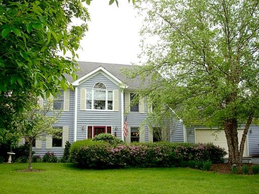 39W012 Ridge Line Road St. Charles, IL 60175 - Photo 1 of 1 a front view of house with yard and green space