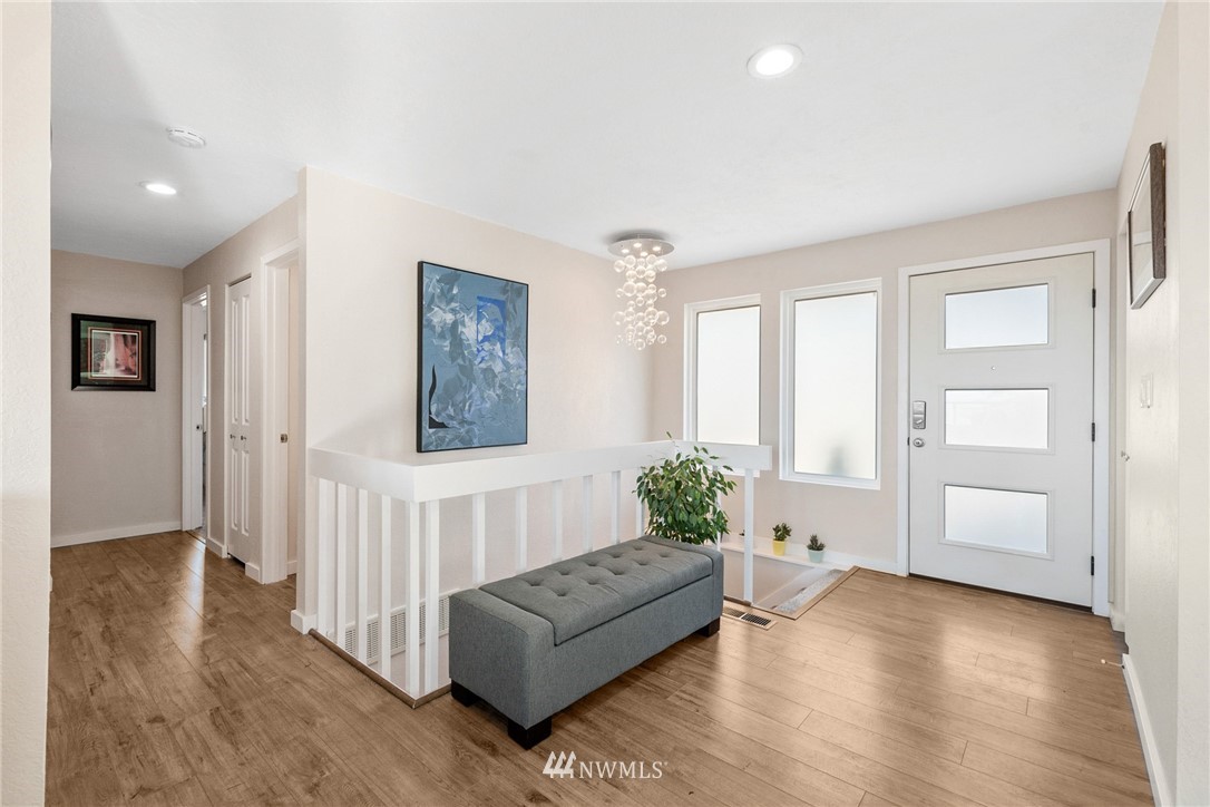 9337 45th Avenue Southwest Seattle, WA 98136 - Photo 13 of 30 a living room with furniture and wooden floor